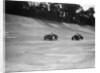 Austin Ulster leading a Windsor on the banking at Brooklands by Bill Brunell
