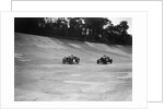 Austin Ulster leading a Windsor on the banking at Brooklands by Bill Brunell