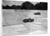 MG C type and Amilcar C6 racing on the banking at Brooklands by Bill Brunell