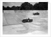MG C type and Amilcar C6 racing on the banking at Brooklands by Bill Brunell