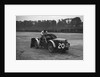 Mechanic making adjustments to a MG C type, Brooklands by Bill Brunell