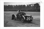 Mechanic making adjustments to a MG C type, Brooklands by Bill Brunell