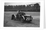 Mechanic making adjustments to a MG C type, Brooklands by Bill Brunell