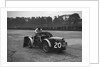 Mechanic making adjustments to a MG C type, Brooklands by Bill Brunell
