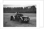 Mechanic making adjustments to a MG C type, Brooklands by Bill Brunell