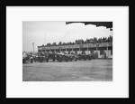 Cars at the start of a race at a JCC Meeting, Brooklands by Bill Brunell