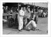 Mechanic working on a Talbot 105 at the JCC Double Twelve race, Brooklands, 8/9 May 1931 by Bill Brunell