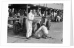 Mechanic working on a Talbot 105 at the JCC Double Twelve race, Brooklands, 8/9 May 1931 by Bill Brunell