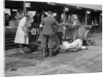 Mechanic working on a Lea Francis J type at the JCC Double Twelve race, Brooklands, May 1931 by Bill Brunell