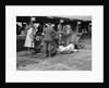 Mechanic working on a Lea Francis J type at the JCC Double Twelve race, Brooklands, May 1931 by Bill Brunell