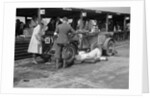 Mechanic working on a Lea Francis J type at the JCC Double Twelve race, Brooklands, May 1931 by Bill Brunell