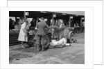 Mechanic working on a Lea Francis J type at the JCC Double Twelve race, Brooklands, May 1931 by Bill Brunell