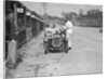 J Reeves and HHB Beacon's Austin Ulster in the pits, JCC Double Twelve race, Brooklands, 1931 by Bill Brunell