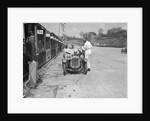 J Reeves and HHB Beacon's Austin Ulster in the pits, JCC Double Twelve race, Brooklands, 1931 by Bill Brunell