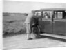 Hugh McConnell, Sammy Davis and Mrs Davis with an Austin 20/6 landaulette at Brooklands, 1931 by Bill Brunell