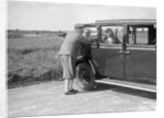 Hugh McConnell, Sammy Davis and Mrs Davis with an Austin 20/6 landaulette at Brooklands, 1931 by Bill Brunell