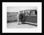 Hugh McConnell, Sammy Davis and Mrs Davis with an Austin 20/6 landaulette at Brooklands, 1931 by Bill Brunell