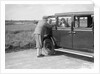 Hugh McConnell, Sammy Davis and Mrs Davis with an Austin 20/6 landaulette at Brooklands, 1931 by Bill Brunell
