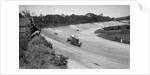 Eddie Hall's Bentley leading a Bugatti on the banking at Brooklands. by Bill Brunell