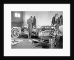 Mechanics working on Raymond Mays' 4500 cc Invicta car by Bill Brunell