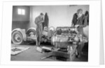 Mechanics working on Raymond Mays' 4500 cc Invicta car by Bill Brunell