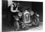 Geoffrey Baker working on a Salmson 1090cc car by Bill Brunell