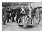 People examining Leon Cushman's Austin 7 racer at Brooklands for a speed record attempt, 1931 by Bill Brunell