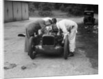 Mechanics working on Leon Cushman's Austin 7 racer for a speed record attempt, Brooklands, 1931 by Bill Brunell