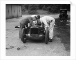 Mechanics working on Leon Cushman's Austin 7 racer for a speed record attempt, Brooklands, 1931 by Bill Brunell