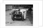 Mechanics working on Leon Cushman's Austin 7 racer for a speed record attempt, Brooklands, 1931 by Bill Brunell