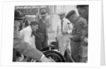 People examining Leon Cushman's Austin 7 racer at Brooklands for a speed record attempt, 1931 by Bill Brunell