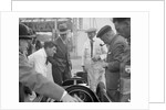 People examining Leon Cushman's Austin 7 racer at Brooklands for a speed record attempt, 1931 by Bill Brunell