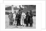 Leon Cushman being carried aloft after making a successful speed record attempt, Brooklands, 1931 by Bill Brunell