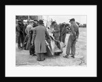 People examining Leon Cushman's Austin 7 racer at Brooklands for a speed record attempt, 1931 by Bill Brunell