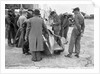 People examining Leon Cushman's Austin 7 racer at Brooklands for a speed record attempt, 1931 by Bill Brunell