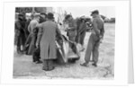 People examining Leon Cushman's Austin 7 racer at Brooklands for a speed record attempt, 1931 by Bill Brunell