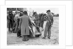 People examining Leon Cushman's Austin 7 racer at Brooklands for a speed record attempt, 1931 by Bill Brunell