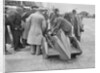 People examining Leon Cushman's Austin 7 racer at Brooklands for a speed record attempt, 1931 by Bill Brunell