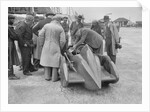 People examining Leon Cushman's Austin 7 racer at Brooklands for a speed record attempt, 1931 by Bill Brunell
