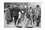 People examining Leon Cushman's Austin 7 racer at Brooklands for a speed record attempt, 1931 by Bill Brunell