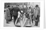 People examining Leon Cushman's Austin 7 racer at Brooklands for a speed record attempt, 1931 by Bill Brunell