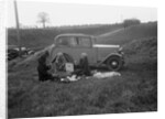 Three women having a picnic during a road test of a Triumph Scorpion, 1931 by Bill Brunell