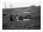 Three women having a picnic during a road test of a Triumph Scorpion, 1931 by Bill Brunell