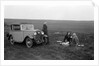 Three women having a picnic during a road test of a Triumph Scorpion, 1931 by Bill Brunell