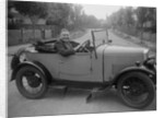 FA Thatcher behind the wheel of a 1929 Triumph Super Seven open four-seater by Bill Brunell