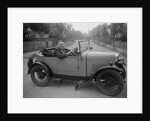 FA Thatcher behind the wheel of a 1929 Triumph Super Seven open four-seater by Bill Brunell