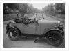 FA Thatcher behind the wheel of a 1929 Triumph Super Seven open four-seater by Bill Brunell