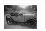 FA Thatcher behind the wheel of a 1929 Triumph Super Seven open four-seater by Bill Brunell
