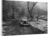 1934 Ford V8 tourer taking part in a motoring trial, late 1930s by Bill Brunell