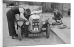 Working on the engine of E Martin's Austin Swallow at the North West London Motor Club Trial, 1929 by Bill Brunell